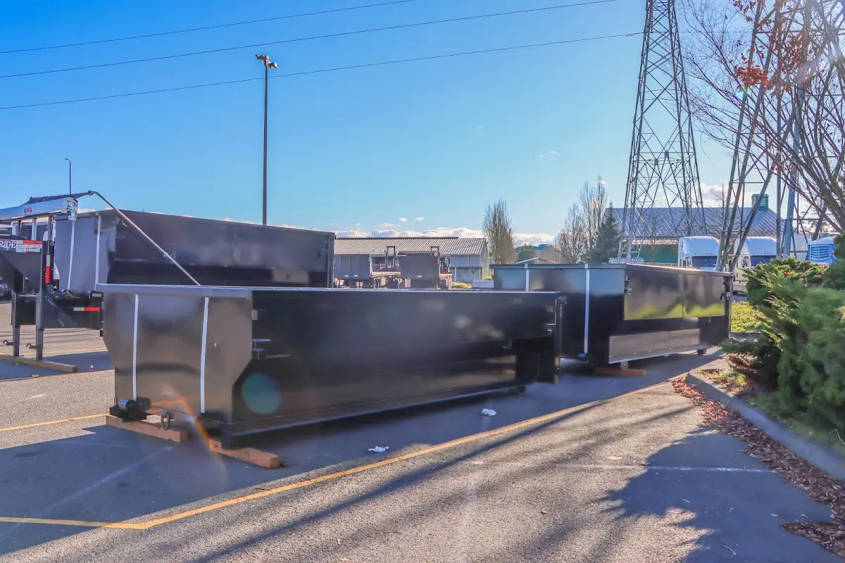 Roll-off dumpster ready for waste disposal at job site for Concrete Dumpster Rental in Chester